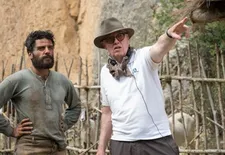 Oscar Isaac and Terry George on the set of The Promise 